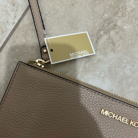 Michael Kors Beige Wristlet with Gold Accents - Picture 3 of 11